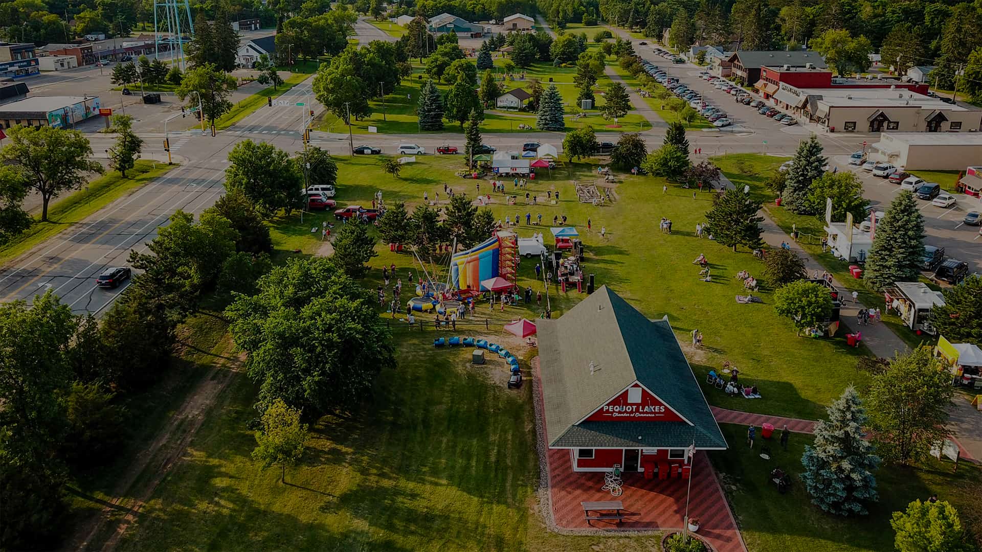 1920x1080 Aerial Photo of Pequot Lakes Park in the summer during a carnival