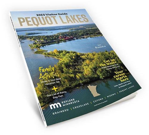 Copy of the 2023 Pequot Lakes Visitor Guide magazine showing an aerial photo of Pelican Lake during sunset on a summer day 500PX