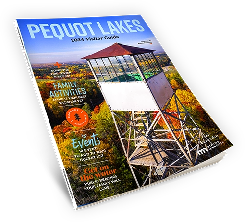 A 2024 Pequot Lakes Visitor Guide magaizne showing the cover with a large photo of a firetower with forest in the background red and orange for all